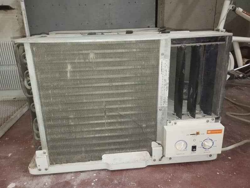 white Westinghouse 2 ton window AC made in Behrain 5