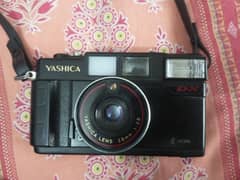 Original Yashica MF 2 CamercaSuper DX Kyocera

Yashica lens 38mm 1:3.8 0