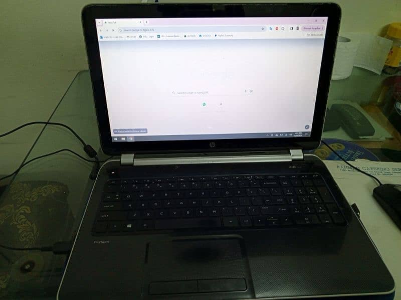 HP Pavilion Laptop with Targus Universal Laptop Charger 1