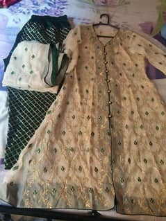 masury gaon with inner shirt and dupatta and silk embroided trouser.