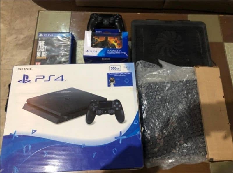 ps4 slim with 2 controller and 4+games 1