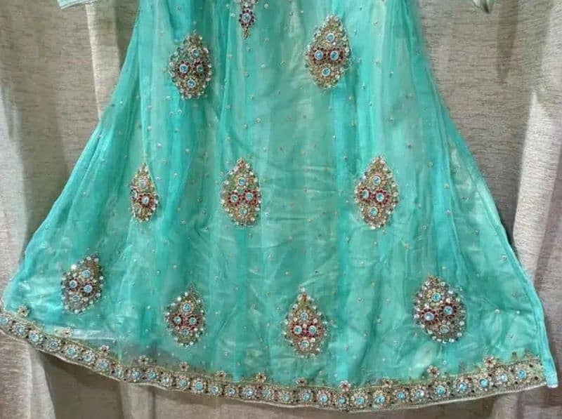 Net short frock with shimar sharara and net dupatta. 2