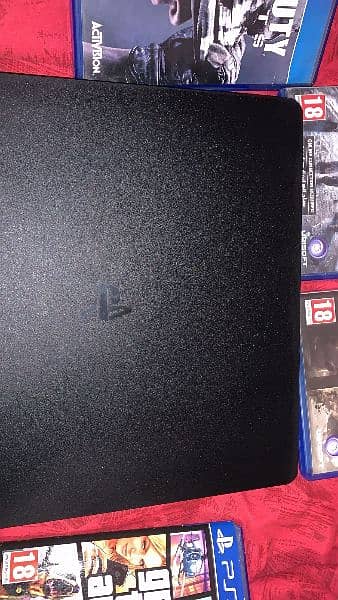 Ps4 slim 500GB with 4 cds 2