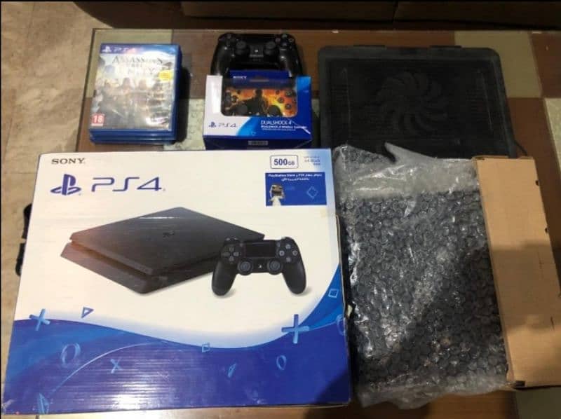 ps4 slim with 2 controller and 4+games 2