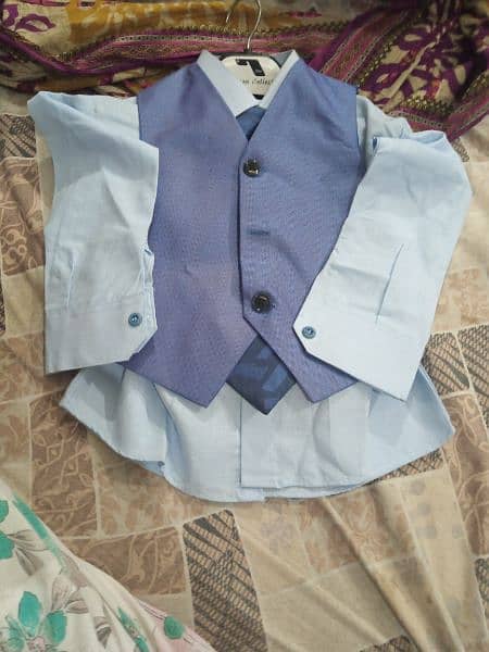 beautiful dresses  for 1 year baby boy. . . only 1 hour used 4