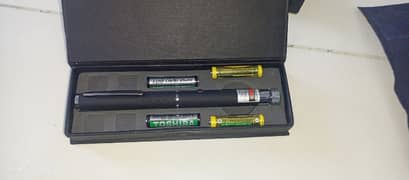 green laser pointer and four batteries are free.