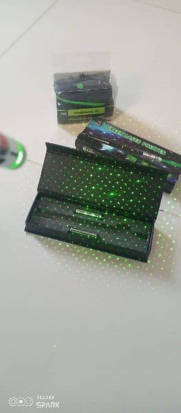 green laser pointer and four batteries are free. 1