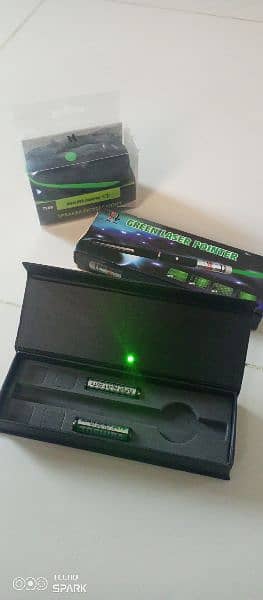 green laser pointer and four batteries are free. 2