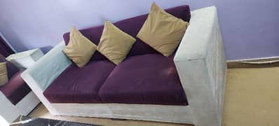 l shaped sofa set. . black color. .  . another sofa set velvet  purple