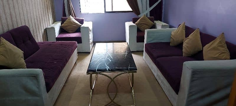 l shaped sofa set. . black color. .  . another sofa set velvet  purple 5
