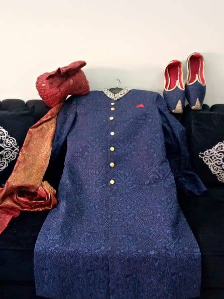 sherwani with matching qulla and khussa 11