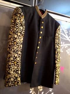prince coat Amir Adnan designer