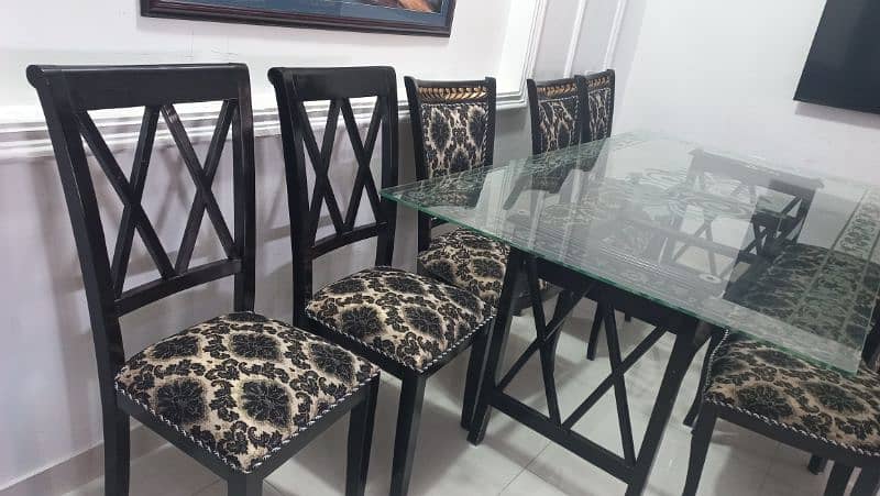 big size dinning table, 6 seater, glass top, wooden chair, almost new 2