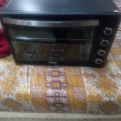 Electri oven 1 time used Black colour