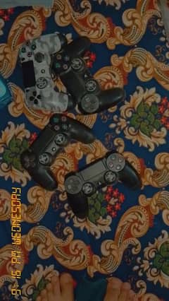 play station 4pro 1TB with 4 controller and 5cd 0