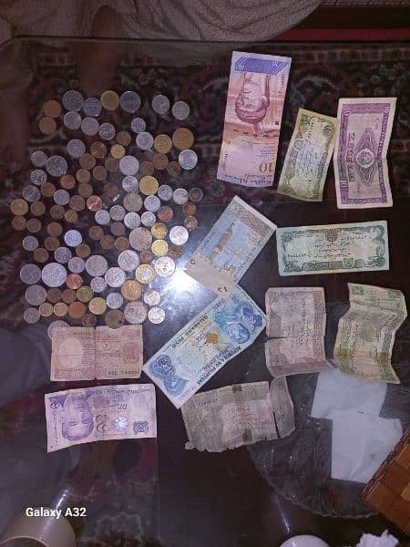 Old coins and currency notes 0
