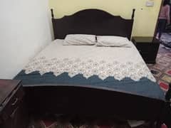 Double bed with side table without mattress