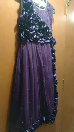 9 to 10 years baby long frock in purple.