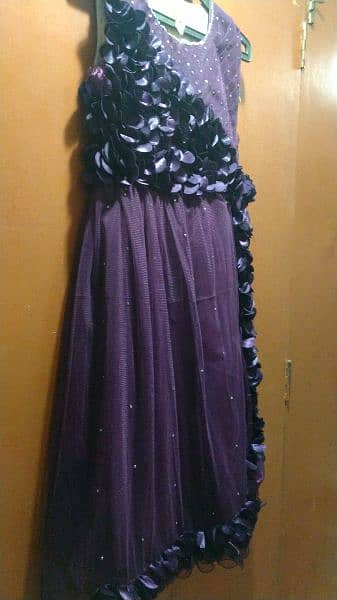 9 to 10 years baby long frock in purple. 0