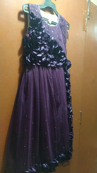 9 to 10 years baby long frock in purple. 1