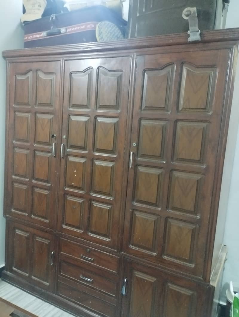 Wooden four door cupboard 0