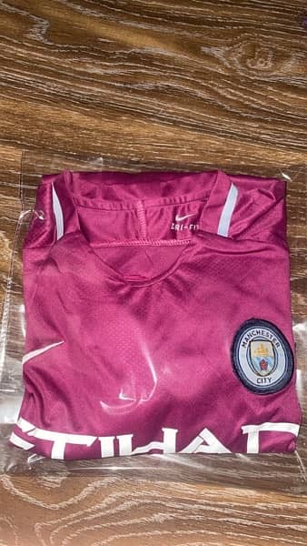 Manchester city football kit 2