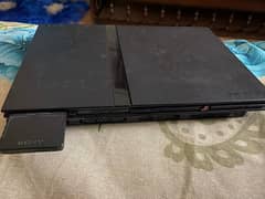 Play Station 2 with 1 console and multiple games (All accessories)
