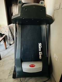 slim line treadmill (new) with auto incline