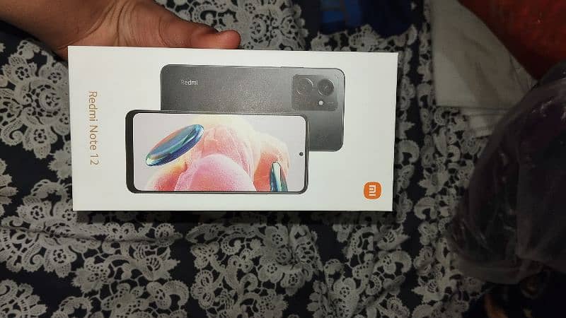 Redmi note 12 8 128 GB only 2 weeks used with box 0