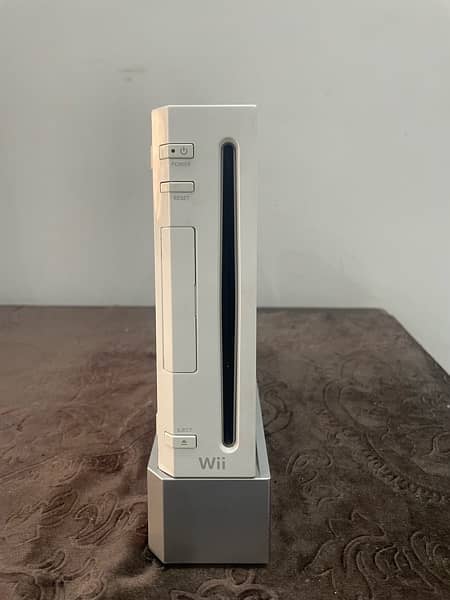 Wii game Brand new condition with remote and 2 games 0