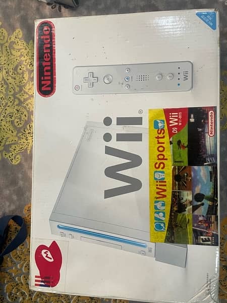 Wii game Brand new condition with remote and 2 games 8