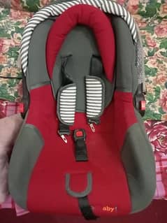 baby carry cot and car seat