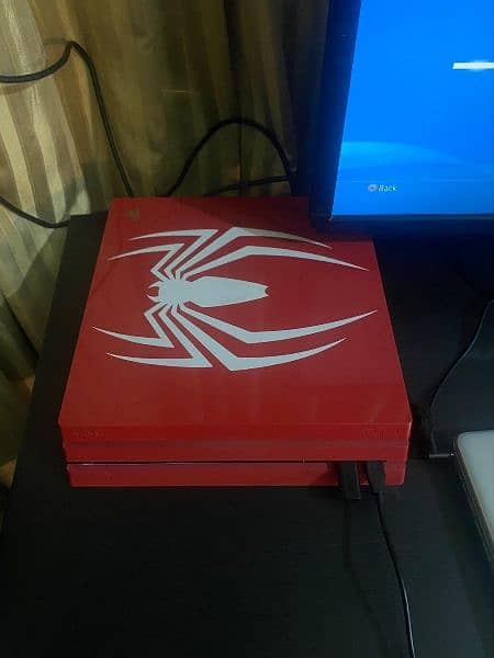 ps4 pro (spider-man limited edition) + sony gold headset + 2 games 2