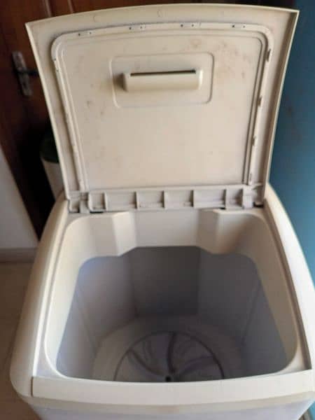 Haier Dryer 6-KG 
And the Electrolux washing machine is  full size 8