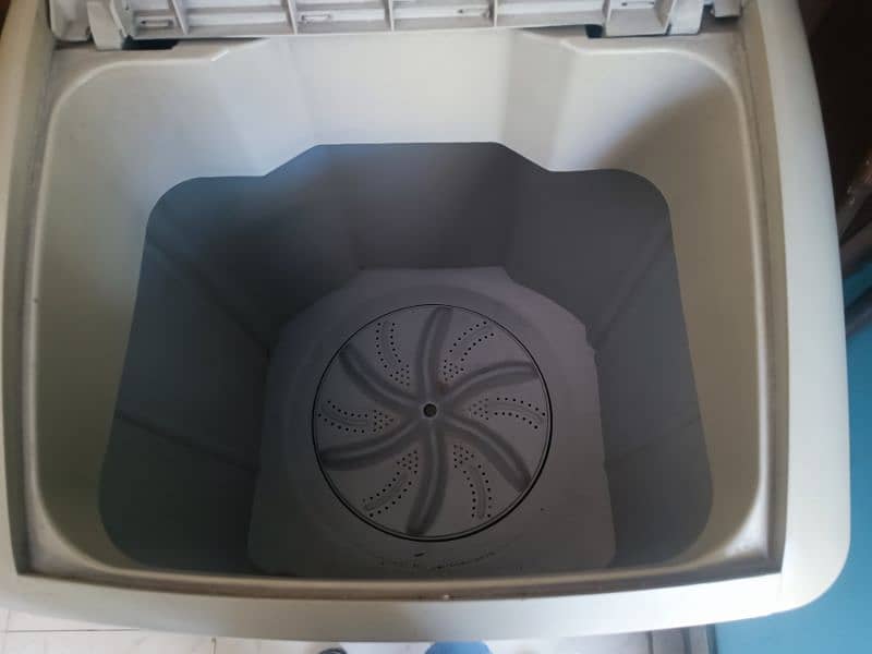 Haier Dryer 6-KG 
And the Electrolux washing machine is  full size 10