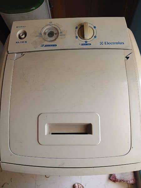 Haier Dryer 6-KG 
And the Electrolux washing machine is  full size 12
