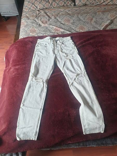 Original American H & M White Ripped jeans 1