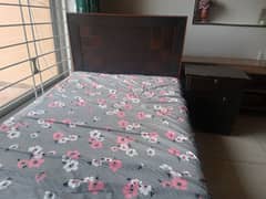 decent condition bed with a side drawer available for sale