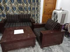 solid wooden sofa 5 seater with large size table in good condition