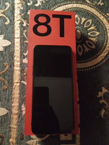 One Plus 8t 12gb 256gb original box charger available slightly used 1