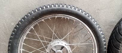 100 cc Bike mokammal Rim 2.75#18
. Diamond Tubeless Tyre 100/90.18