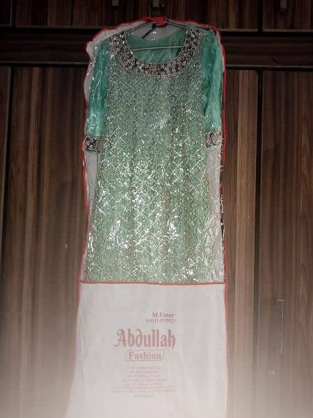 bridal long maxi with  full embroidery in ferozi colour 1