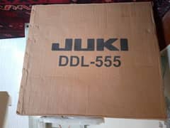 DDL-555 juki sewing machine new. with table n motor 0