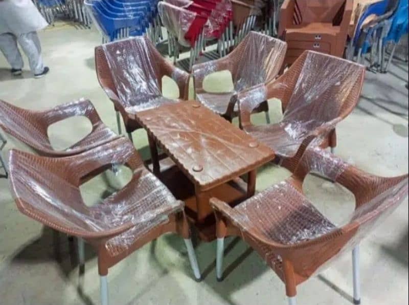 Set of 4 plastic chairs with 1 table available at wholesale price 0