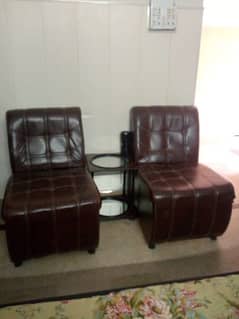 Two seater sofa with center table
