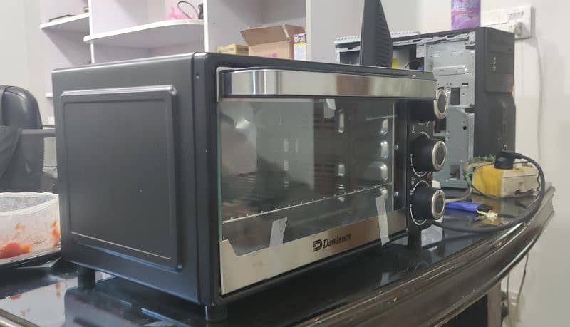 Dawlance DMWO 2113c electric oven one time used 1