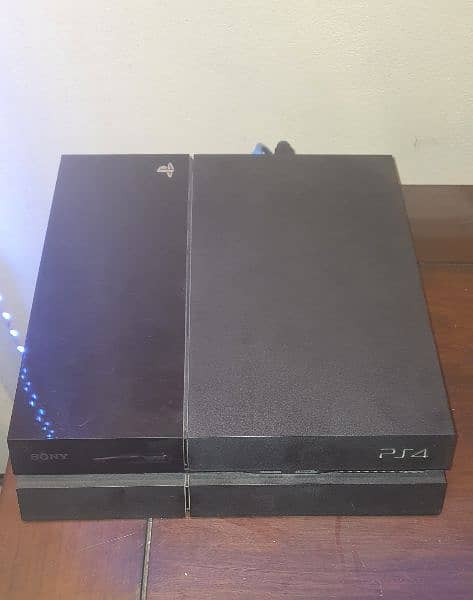 PS4 with box, 1 original & 2 copy controller, charging dock and games 1