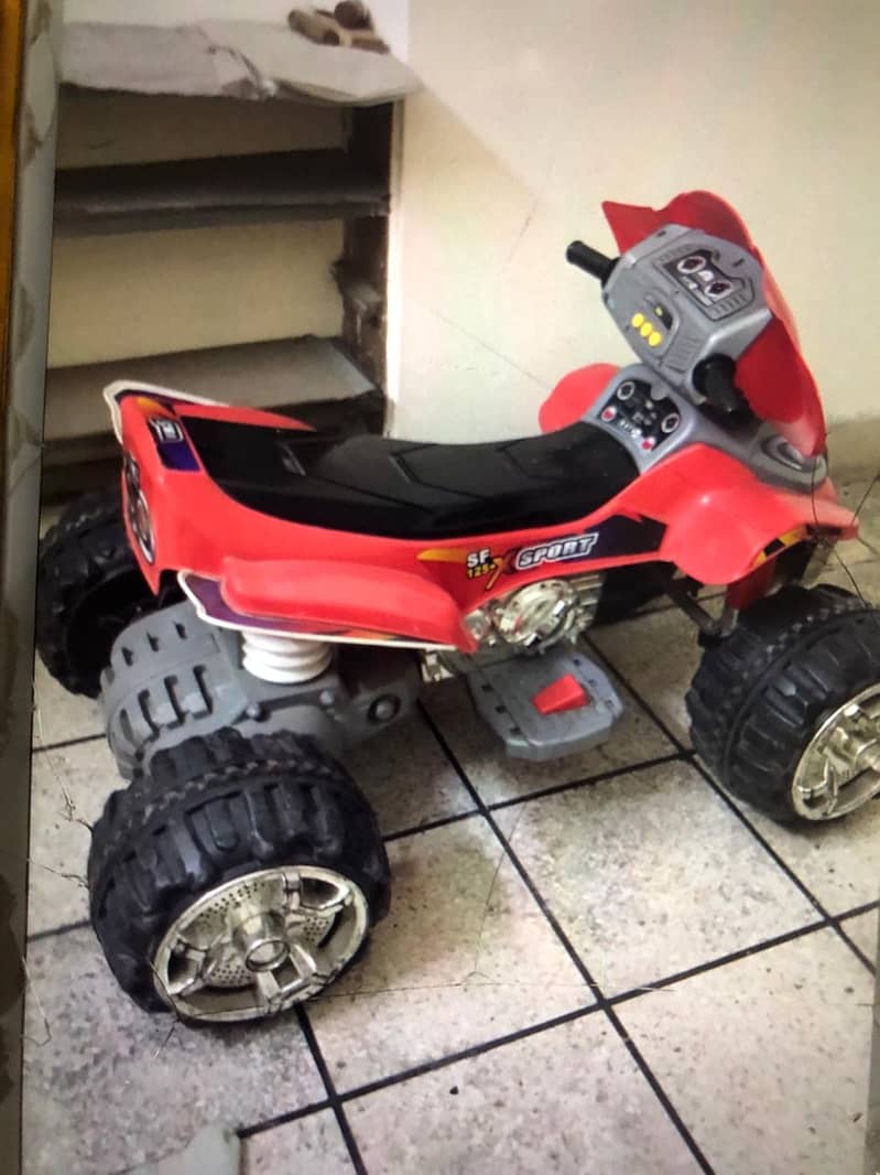 KIDS BIKE 4 WHEELER BATTERY OPERATED 1