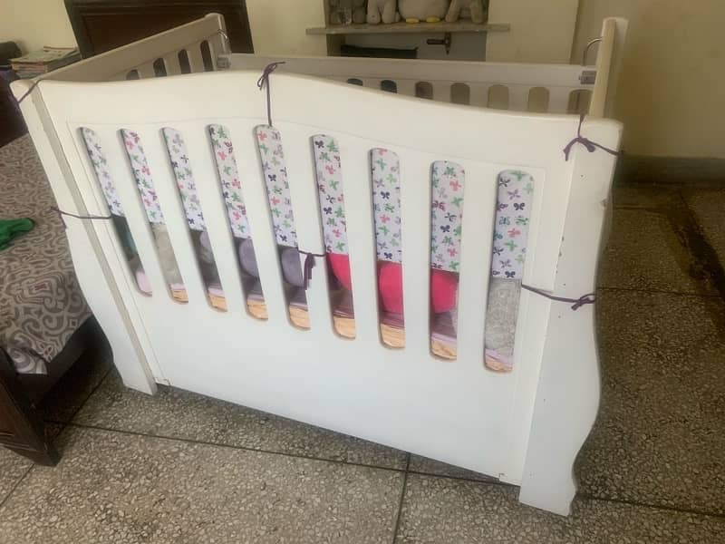 baby cot with good matteess made of imported sheets n deco paint 4
