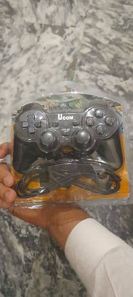 gamepad branded  gaming controller  Ucom company 1